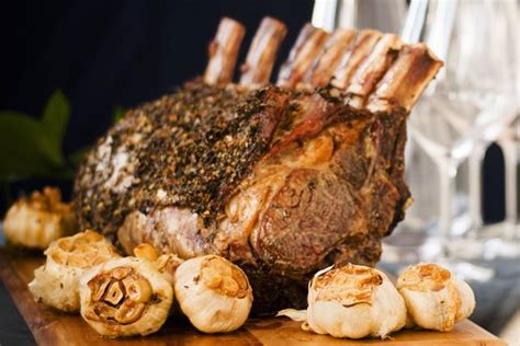 9 to 10 pounds), 1/4 cup mixed peppercorns (pink, white, and green), 3 tablespoons plus 2 1/2 teaspoons kosher salt, divided, 2 tablespoons chopped fresh thyme, 2 tablespoons chopped fresh rosemary. Prime Rib Beef Roast with Roasted Garlic | Recipe | Beef ...