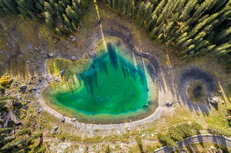 Aerial View Of A Small Alpine Lake Carezza O Karersee Located In The