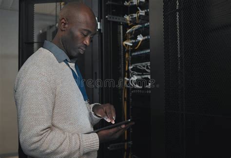 Engineer Server Room Or Black Man With Tablet For Database Connection