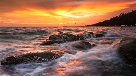 Sunset At Lan Hin Khaw Beach Rayong Thailand Sea Waves Rocks Orange Red