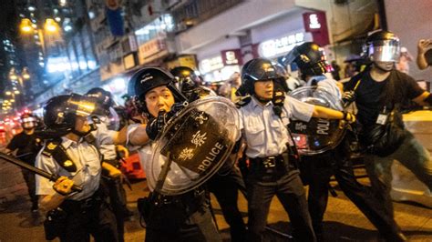 Hong Kong Officer Fires Shot And Police Use Water Cannons At Protest