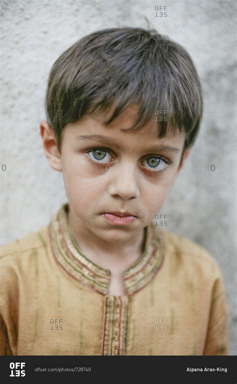 Portrait Of A Boy With Blue Eyes In India Stock Photo Offset