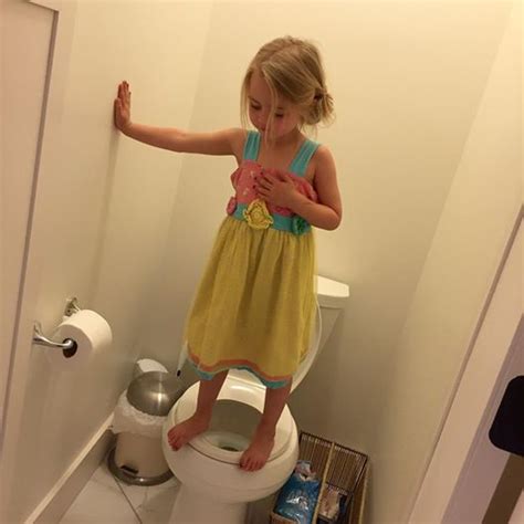 Photo Of Babe Girl Standing On Toilet Goes Viral For Unusual Reason