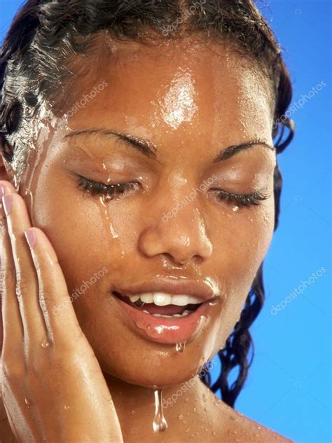 Beautiful Young Latina Woman With Wet Face Stock Photo By ©gustavo