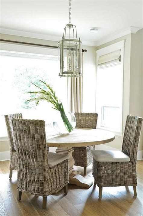 All tables fold flat for quick, easy storage. Round Salvaged Wood Dining Table with Wicker Dining Chairs ...