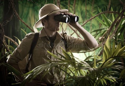 Explorer In The Jungle With Binoculars Stock Image Image Of