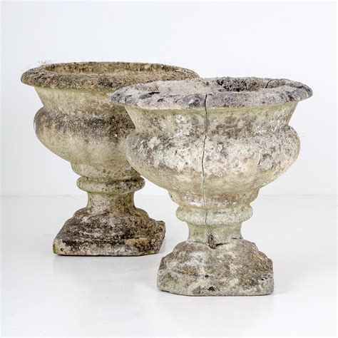 Pair Of English Weathered Urns Cooling And Cooling