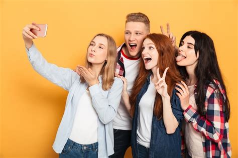 Premium Photo Group Of Joyful School Friends Taking A Selfie