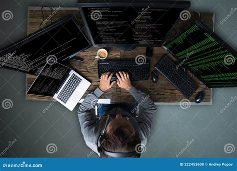 Hacker Hacking Multiple Computers On Desk Stock Photo Image Of