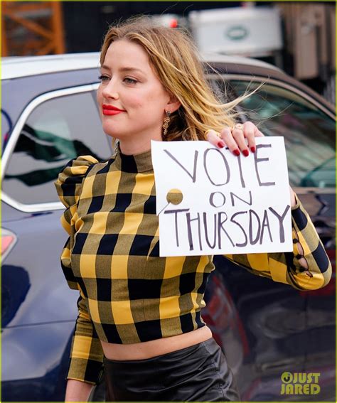 Amber Heard Holds Handmade Sign Encouraging Fans To Vote Photo