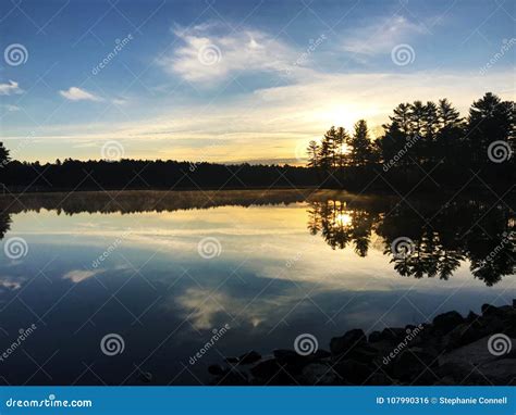 Sunset On A Quiet Calm Lake Stock Photo Image Of Hike Mountatins