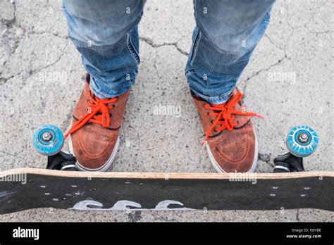 Feet And Legs Of Boy With Skateboard Stock Photo Alamy
