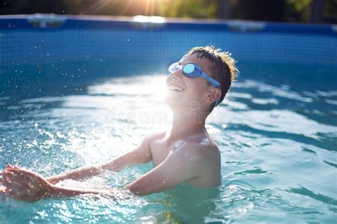 Happy Kid Enjoying Summer In Swimming Pool Stock Photo Image Of Blue