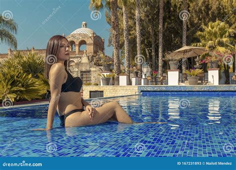 Latina By The Blue Swimming Pool Latin Woman By Swimming Pool Stock
