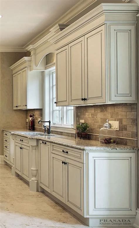 Traditional kitchen with antique white cabinets and white appliances. +20 The Most Popular Gray Glazed Kitchen Cabinets Diy 39 ...