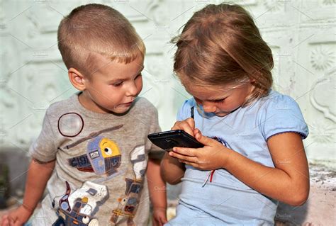 Children Play With Smartphone Featuring Child Mobile And Smartphone