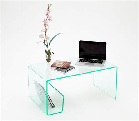 Clear acrylic coffee table with magazine rack, source: Glass Effect Acrylic Coffee Table | Buy Direct from GPX