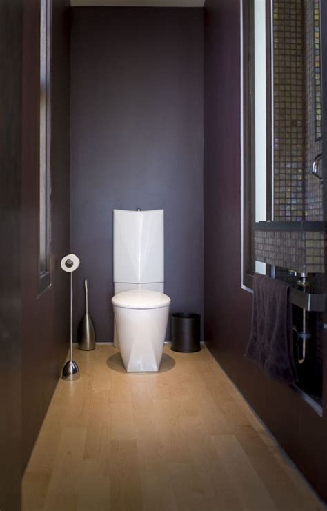 It functions as a small room with a toilet, a sink, and an area for hand towels to refurbish. How To Make A Narrow Powder Room Feel Inviting And ...