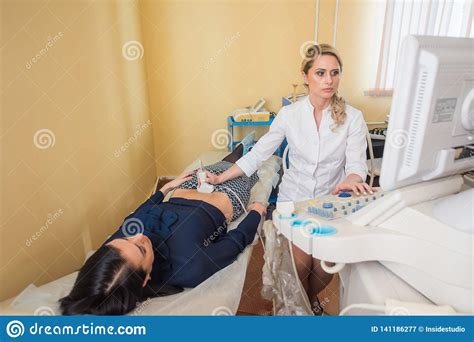 Ultrasound Test Pregnancy Gynecologist Checking Fetal Life With Scanner Exam Stock Image