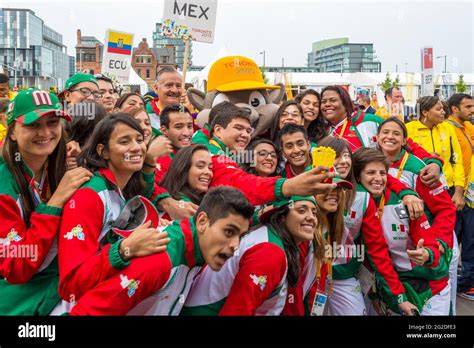 Athletes From Mexico In Joyful Mood Posing For Photograph With The
