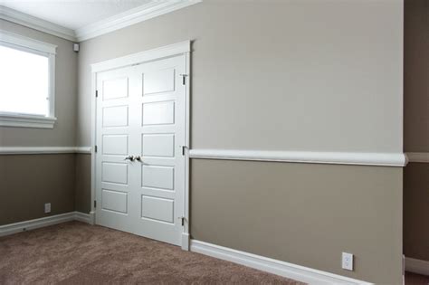 Amazing gallery of interior design and decorating ideas of two tone walls with chair rail in bedrooms, living rooms, dens/libraries/offices, girl's rooms, nurseries, bathrooms, laundry/mudrooms, entrances/foyers by elite interior designers. Strathcona County - Traditional - Basement - Edmonton - by ...