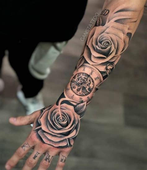 A Man With A Rose Tattoo On His Arm And Hand Is Holding An Open Pocket Watch