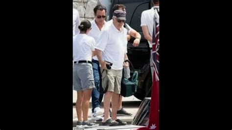 leonardo dicaprio shows off his physique as he goes shirtless in navy swimming trunks and soaks