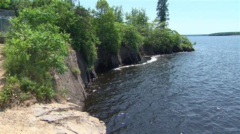Nb Power Puts Up Fence At Cliffs By Mactaquac Dam Cbc News