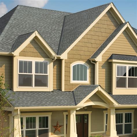 As for the brown roof, it has a medium tone. GAF_Timberline_HD_Pewter_Gray_House_1_1440x1440 - Moss Home Improvement & Roofing, Inc.