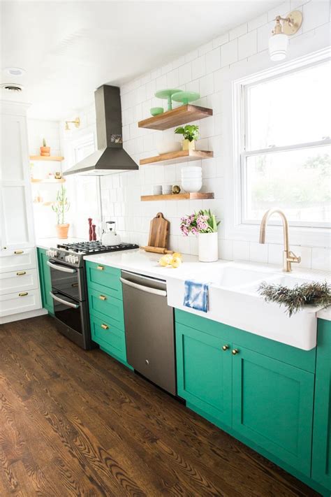 Lauren's bold chicago apartment bursting with diy projects at apartment therapy. Bold, Small Kitchen with Green Cabinets and Slate ...