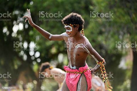 aboriginal australians men dancing traditional dance during australia day celebrations stock