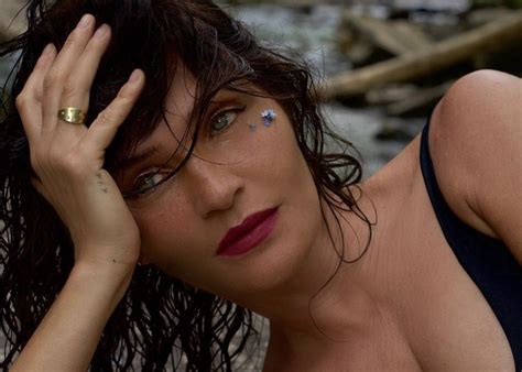 Helena Christensen Showcases Her Age Defying Body In Bathing Suit Snaps And People Are In Awe