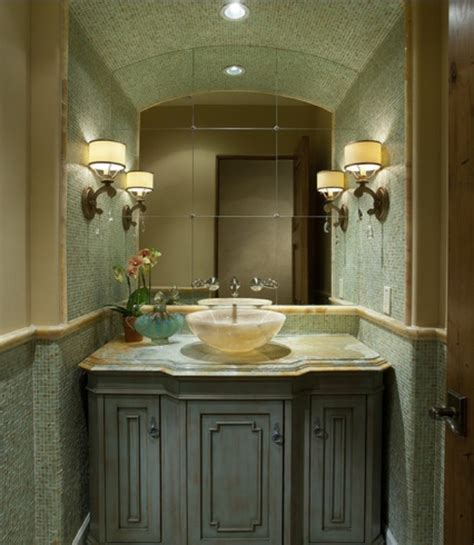 Toothed mirror frames can also balance the straight lines of tiles and dressers, when combined with leaves of tropical plants in a vase. 71 Cool Green Bathroom Design Ideas | DigsDigs
