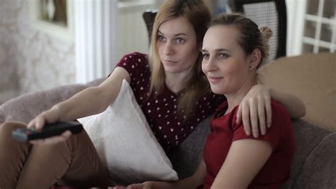 Two Friends Sisters Watching Tv Talking Stock Footage Sbv 314366221
