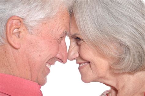 premium photo portrait of a happy elderly couple embracing