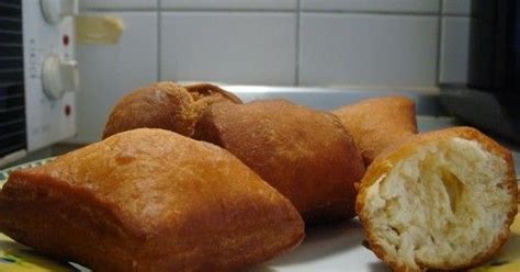 Mandazi is a very common ugandan snack eaten happily whether in the bus or on the streets and at home. Ngumuu or Mandazi | Half cake recipe, Recipes, Mandazi recipe