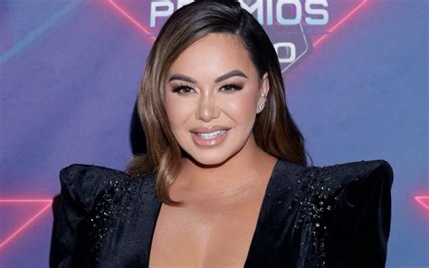 chikis rivera shows off her curves in a swimsuit but is criticized for the look of her lips