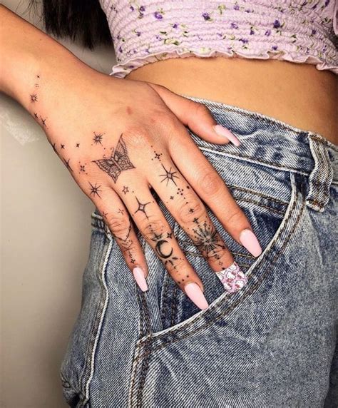 10 finger tattoos to symbolize love strength and beauty small hand tattoos hand tattoos