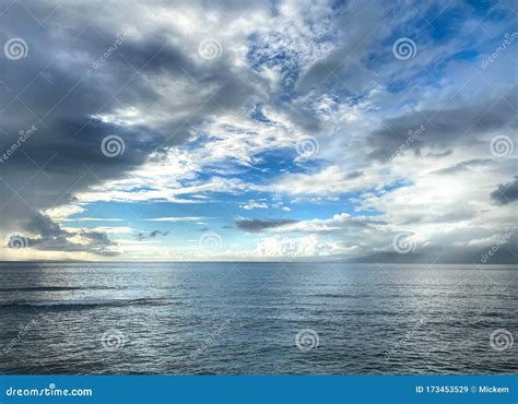 Dark Clouds In Blue Sky Over Open Ocean Stock Image Image Of