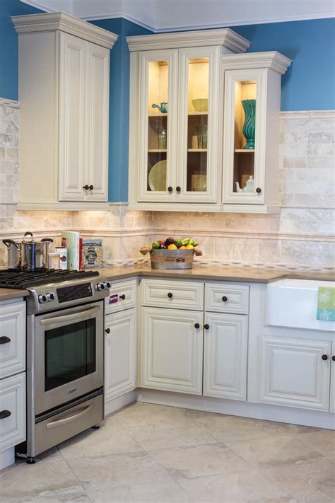 Our kitchen cabinet designers are experienced in all elements of construction and design while giving you the wow factor and being attentive to your we offer many styles of wholesale kitchen cabinets and bathroom vanities at up to 58% off the big box and boutique stores. Victoria Ivory Kitchen Cabinets - Traditional - Kitchen ...