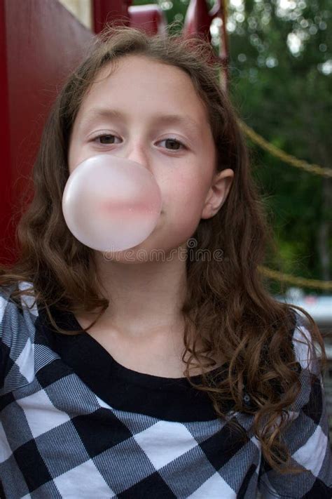 Girl Blowing A Chewing Gum Bubble Stock Image Image Of Bubble Wavy