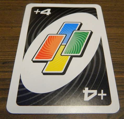 Guy 1 with one card left: UNO Spin Card Game Review and Rules | Geeky Hobbies