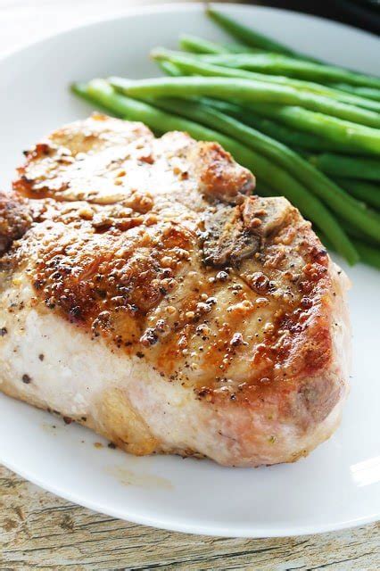 Remove pork chops from milk mixture and coat thoroughly with crumb mixture. Perfect Thick Cut Pork Chops