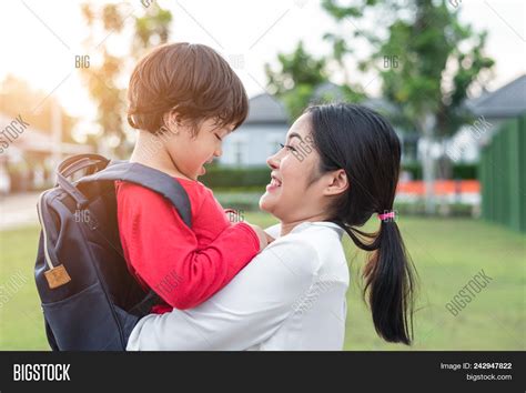 Mom Hug Carry Her Son Image And Photo Free Trial Bigstock