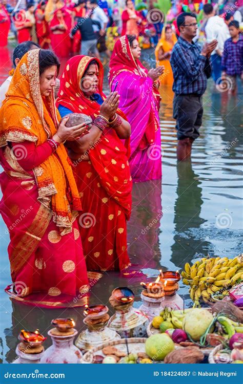 Devotees Offering Prayers To God During Chhath Puja Festival Editorial