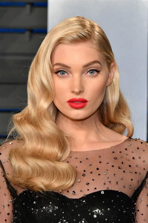 I also always travel with gliders for some leg and glute exercises. Elsa Hosk Retro Hairstyle - Hair Lookbook - StyleBistro