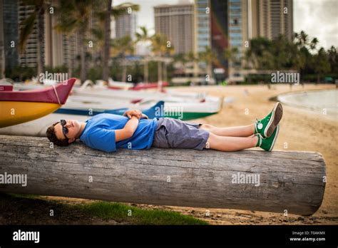 Teenage Boy Beach Sunbathing Hi Res Stock Photography And Images Alamy