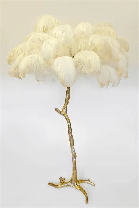 For assistance on product information size and fit placing an order returns exchanges or styling advice please call 1 855 254 3440 monday friday 9am 6pm est or email. Hollywood Regency Sculptural Ostrich Feather Palm Tree Floor Lamp For Sale at 1stdibs