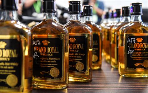 Death toll in Malaysia tainted alcohol scandal hits 21 | The Guardian