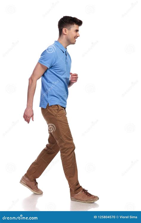 Side View Of A Young Casual Man Walking Stock Photo Image Of Polo